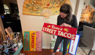 A Night in Old San Antonio’s tradition comes in many forms, including vibrant handmade signs