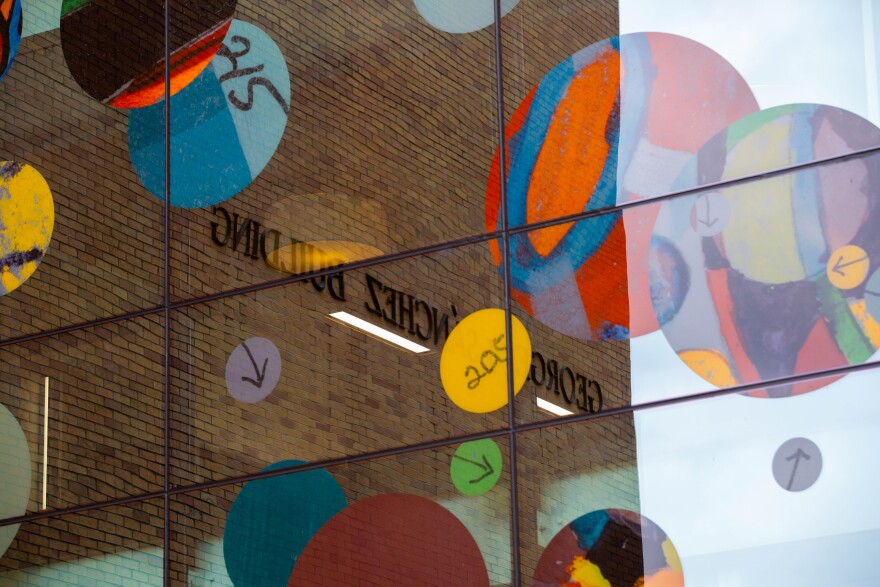 A close up of "Circles" by Howardena Pindell at the George I. Sanchez building at the College of Education on the University of Texas at Austin campus.