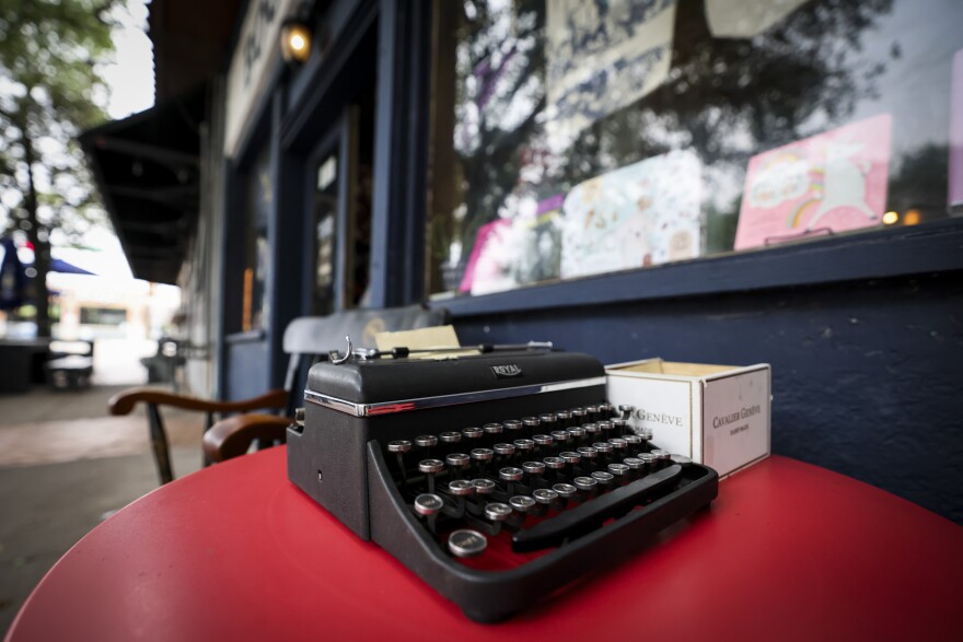 A typewriter is situated outside Poets Books Thursday, April 23, 2026, in Bishop Arts District in Dallas. Owner Marco Cavazos says the store is closing and the last day is April 26.