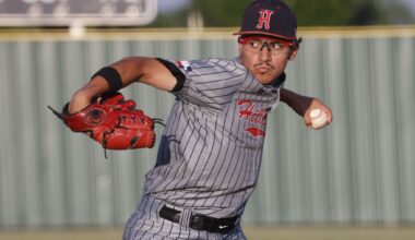 Texas Rangers starting pitcher Nathan Eovaldi, bottom, reacts after giving up a three run home run to Athletics' Carlos Cortes (26) during the fifth inning of a baseball game Friday, April 24, 2026, in Arlington, Texas. (AP Photo/Julio Cortez)