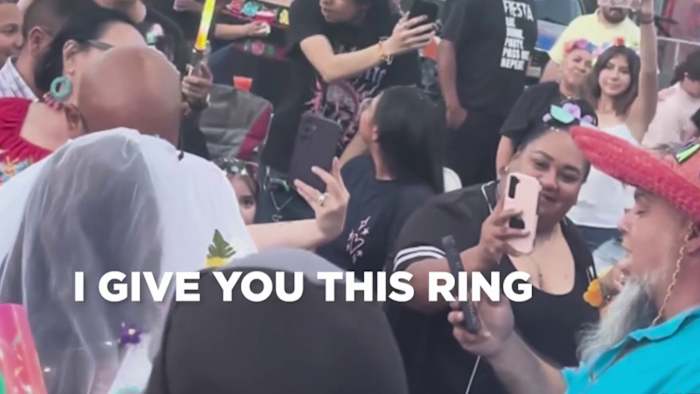 Couple ties the knot during Fiesta Flambeau Parade in downtown San Antonio