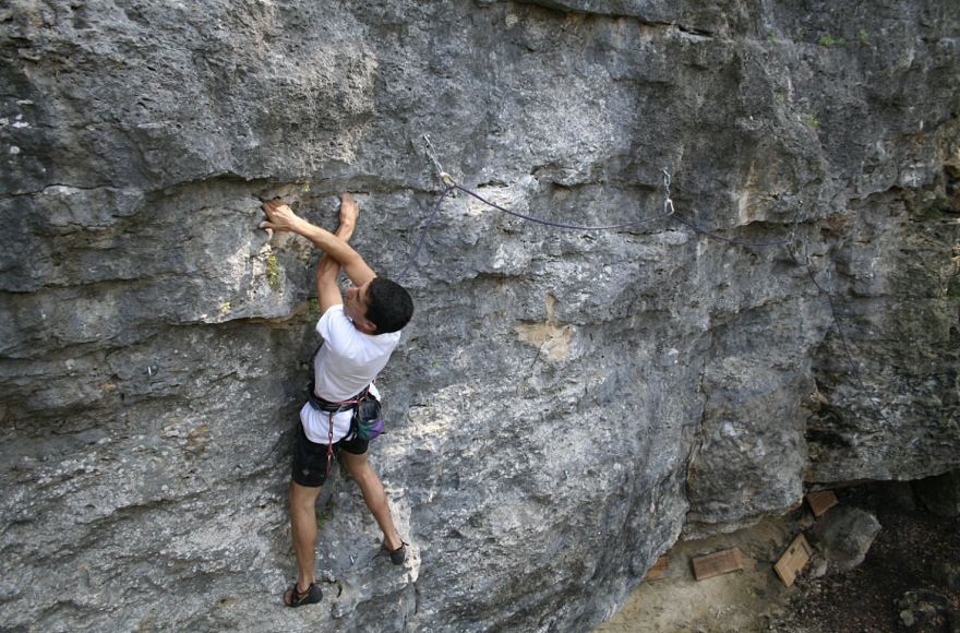 A person climbs at Monster Rock.