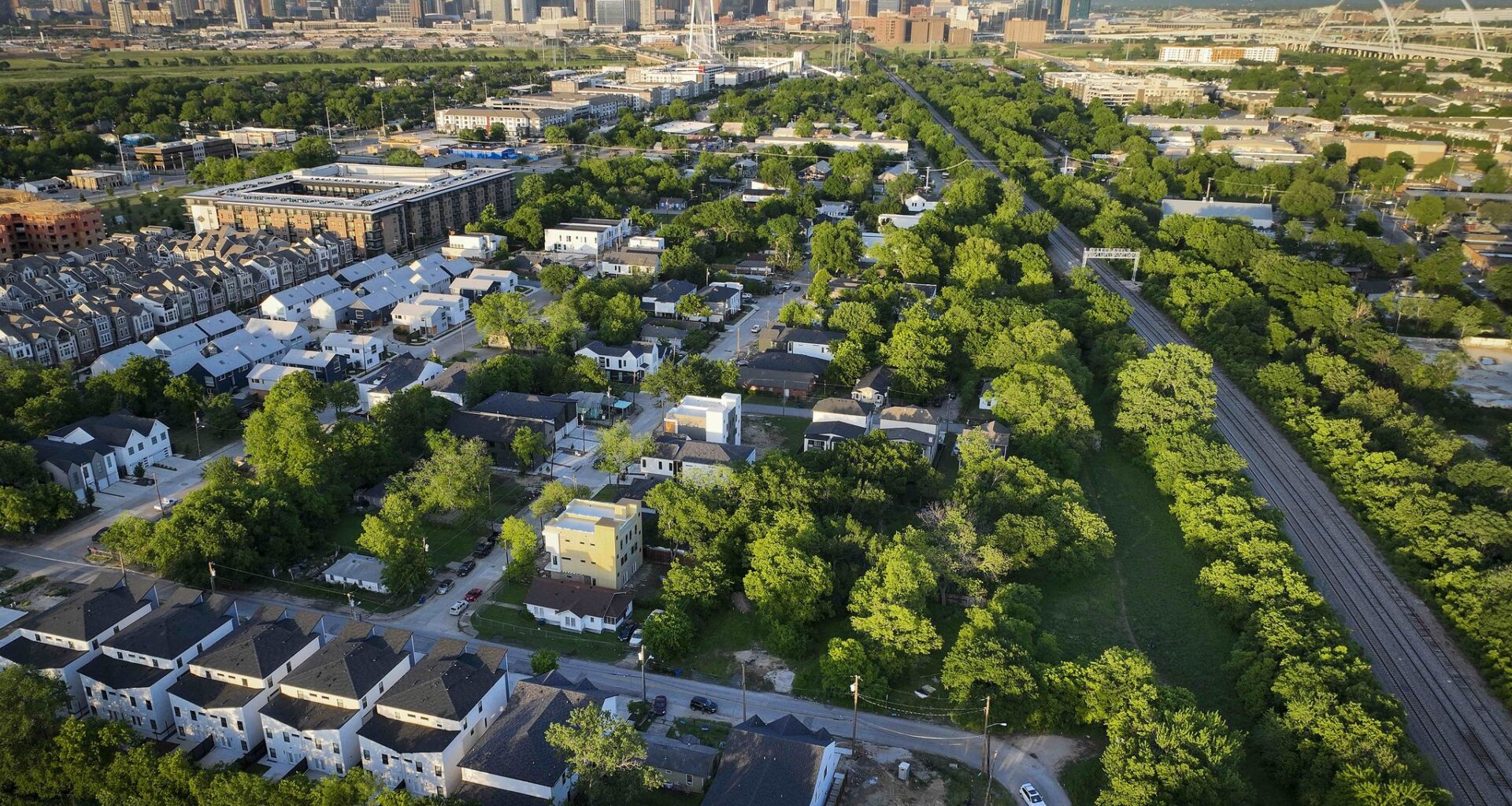Aerial view of the Gilbert-Emory neighborhood looking toward the downtown skyline on Sunday, April 30, 2023 in Dallas.