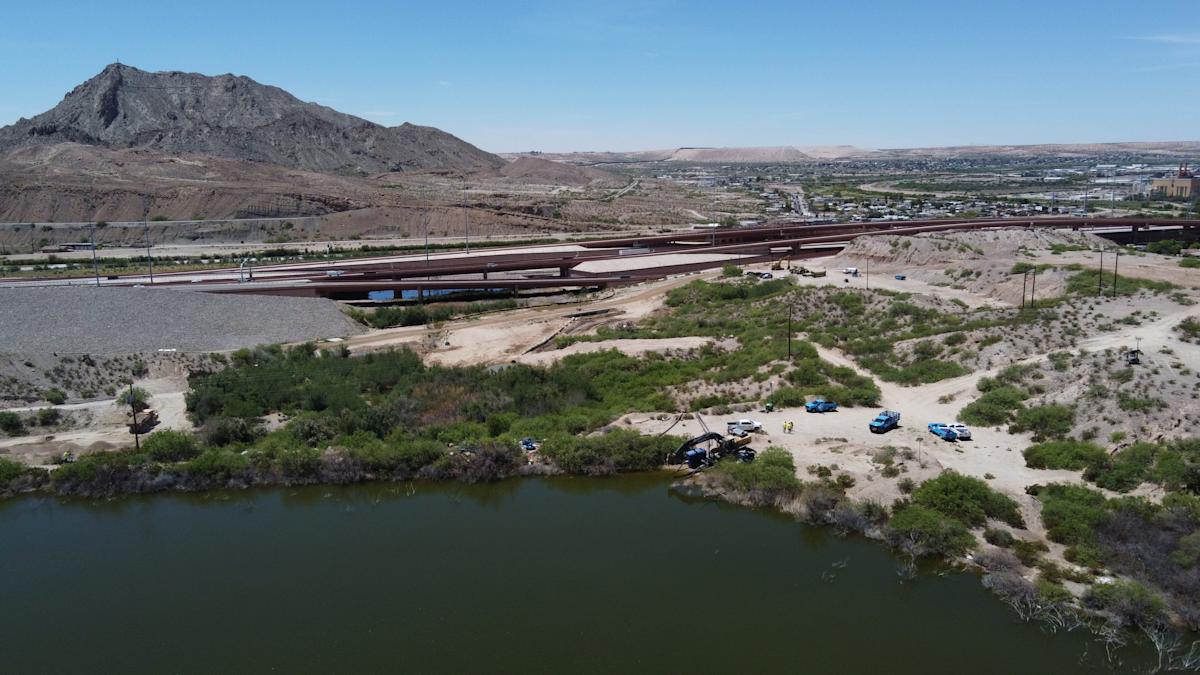 Cement Lake, also known as Portland Reservoir, is seen looking south as the El Paso Police Department closed multiple West El Paso thoroughfares Thursday amid concerns about a potential breach near Doniphan Drive. Closures include Loop 375 at Race Track Drive and Paisano Drive, Doniphan Drive between Race Track and Paisano drives, Sunland Park Drive at Crockett Street, and McNutt Road at River Levee Road while El Paso Water assesses risks and reduces water pressure at the lake.