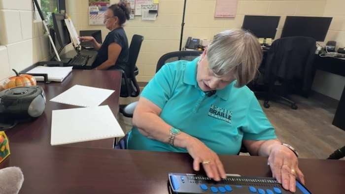 Behind the San Antonio center making Braille textbooks for students who are blind, visually impaired