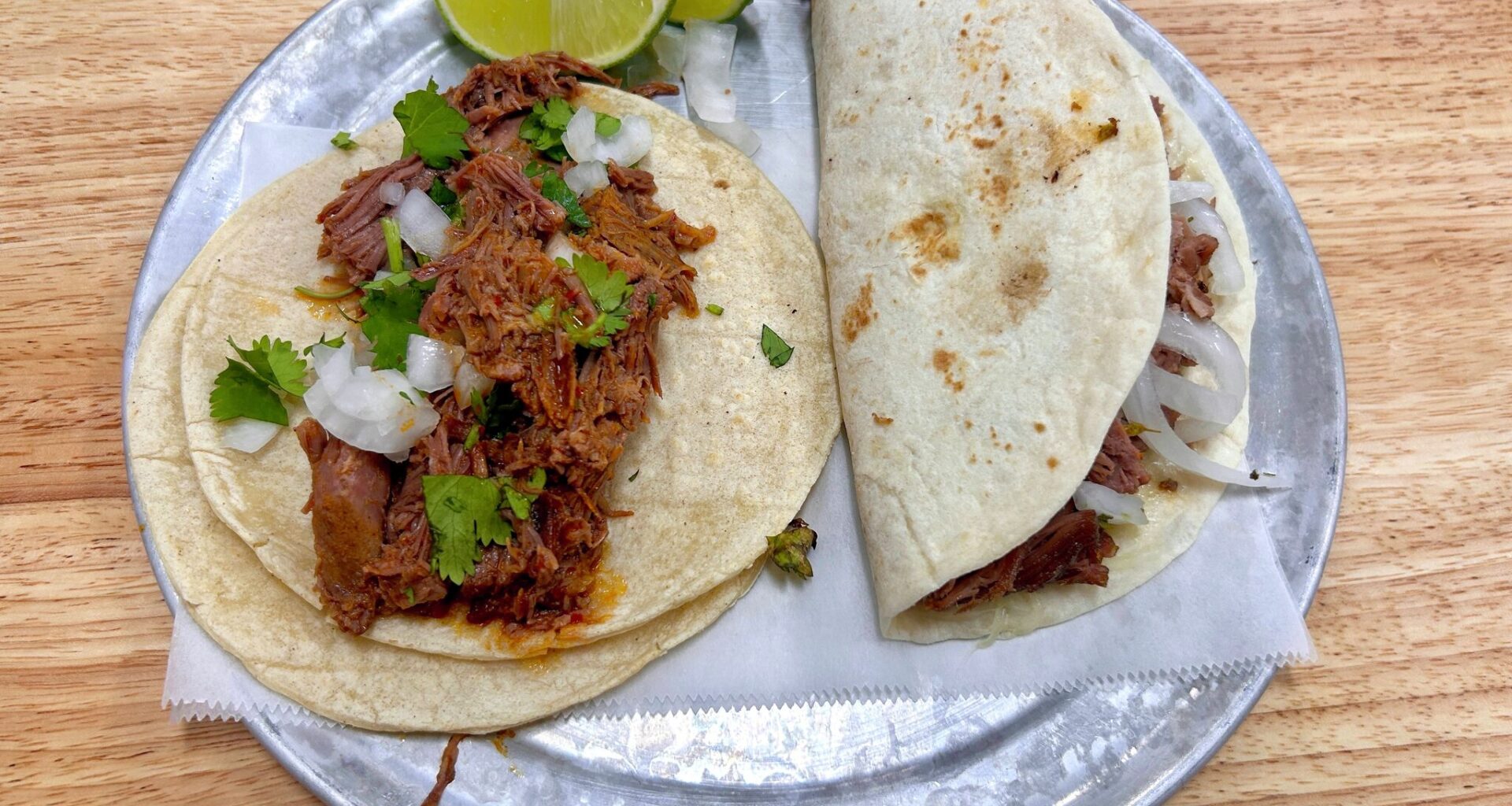 A birria taco and carnitas quesadilla from Tacopolis.
