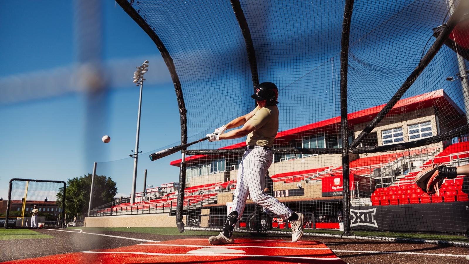 Texas Tech OF Logan Hughes mashes a home run during Tech's Sunday contest against OSU
