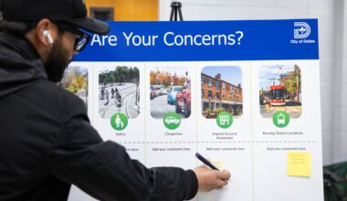 Edwin Juarez of Old East Dallas writes a concern about attracting riders to local businesses at an event to collect feedback on a proposed streetcar in South Dallas, Tuesday, April 21, 2026.