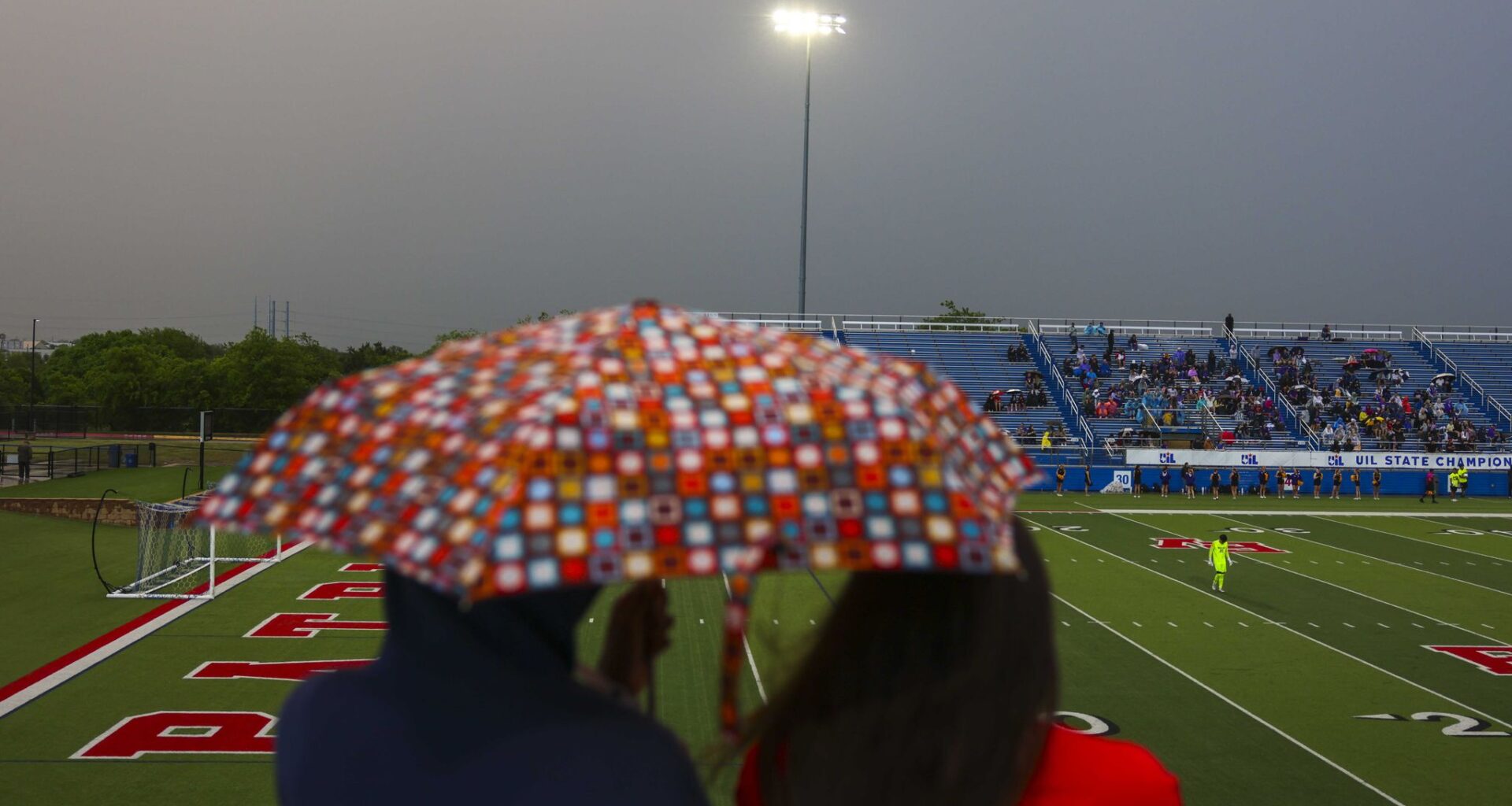 Storm cloud gather in the sky as Frisco Wakeland takes on Comal Pieper during Class 5A Division II championship game, in Georgetown, Friday, April 10, 2026.