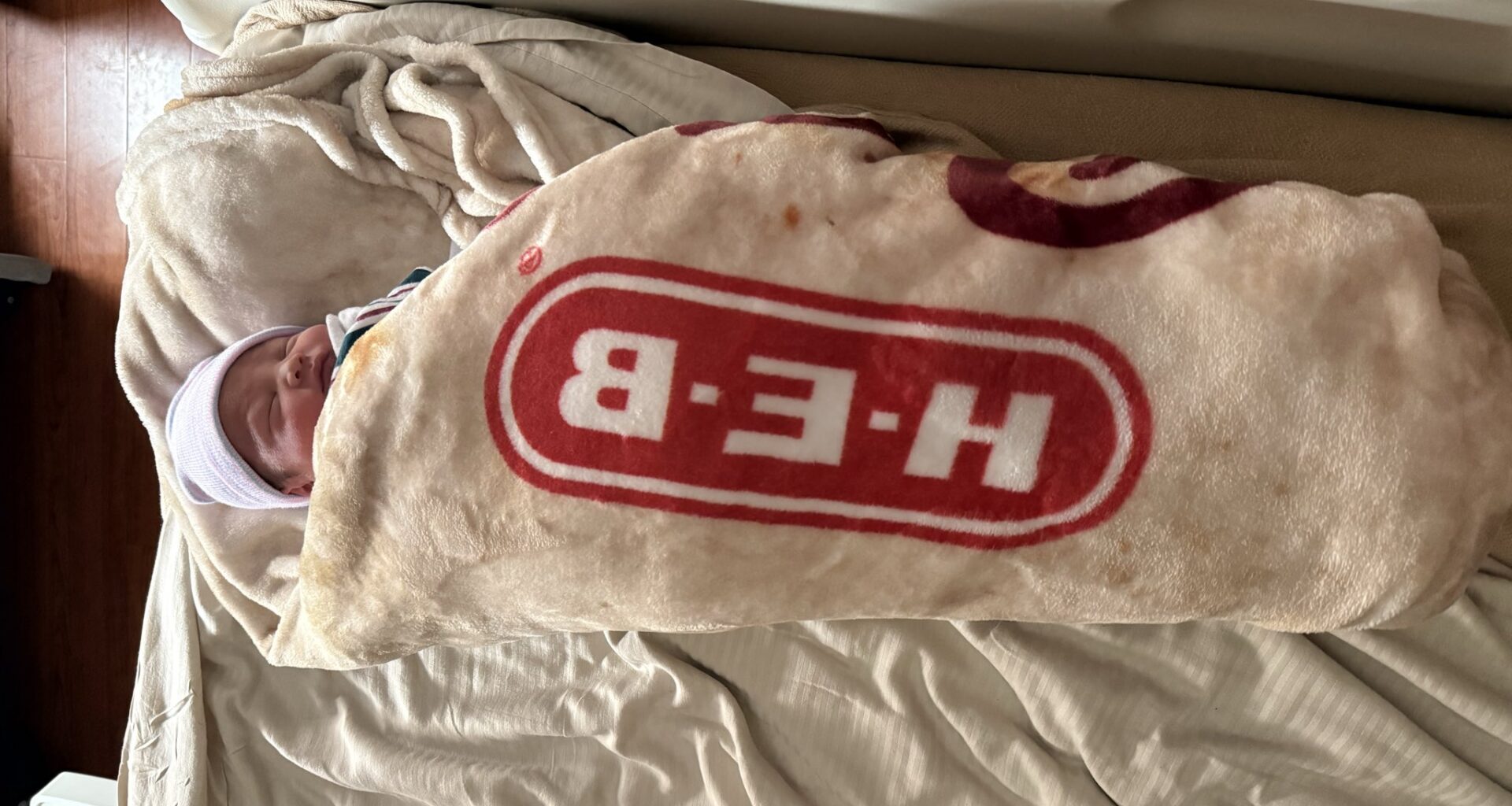Texas couple welcomes newborn with cozy version of H-E-B tortilla