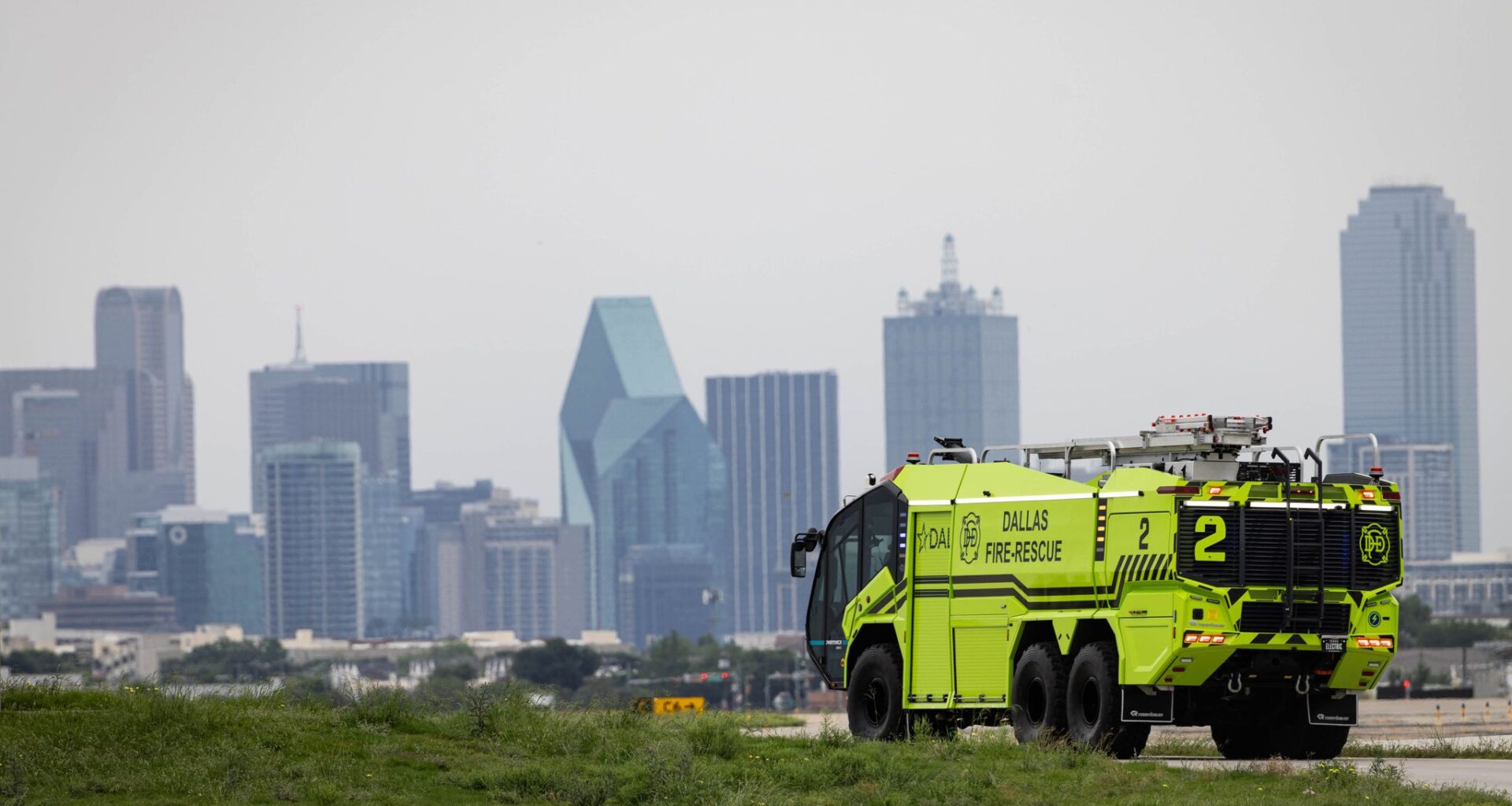 Dallas-Fire Rescue chief Justin Ball climbs out of the PANTHER 6x6 electric vehicle after a demonstration ride in Dallas Love Field airport, Wednesday, April 29, 2026.