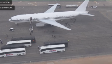 Chartered airliner from Florida lands in El Paso; tour buses seen nearby