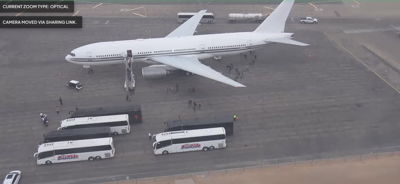 Chartered airliner from Florida lands in El Paso; tour buses seen nearby
