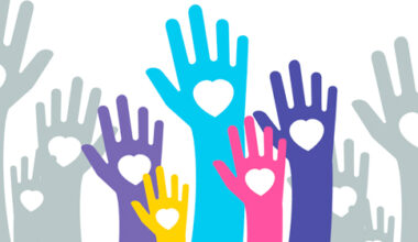 Many colorful heart filled hands