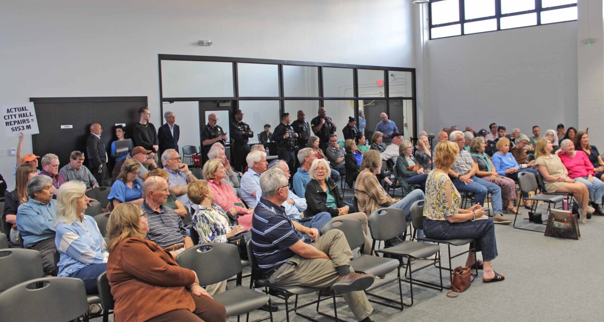 Town hall grows heated over question of saving or selling City Hall