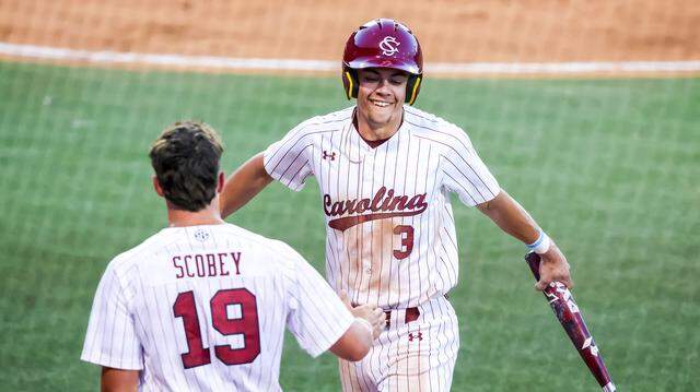 South Carolina Gamecocks infielder Patrick Evans (3) celebrates after scoring against the Texas Longhorns during their game at Founders Park, 4/2/26. South Carolina Gamecocks infielder Patrick Evans (3) celebrates after scoring against the Texas Longhorns during their game at Founders Park, 4/2/26.