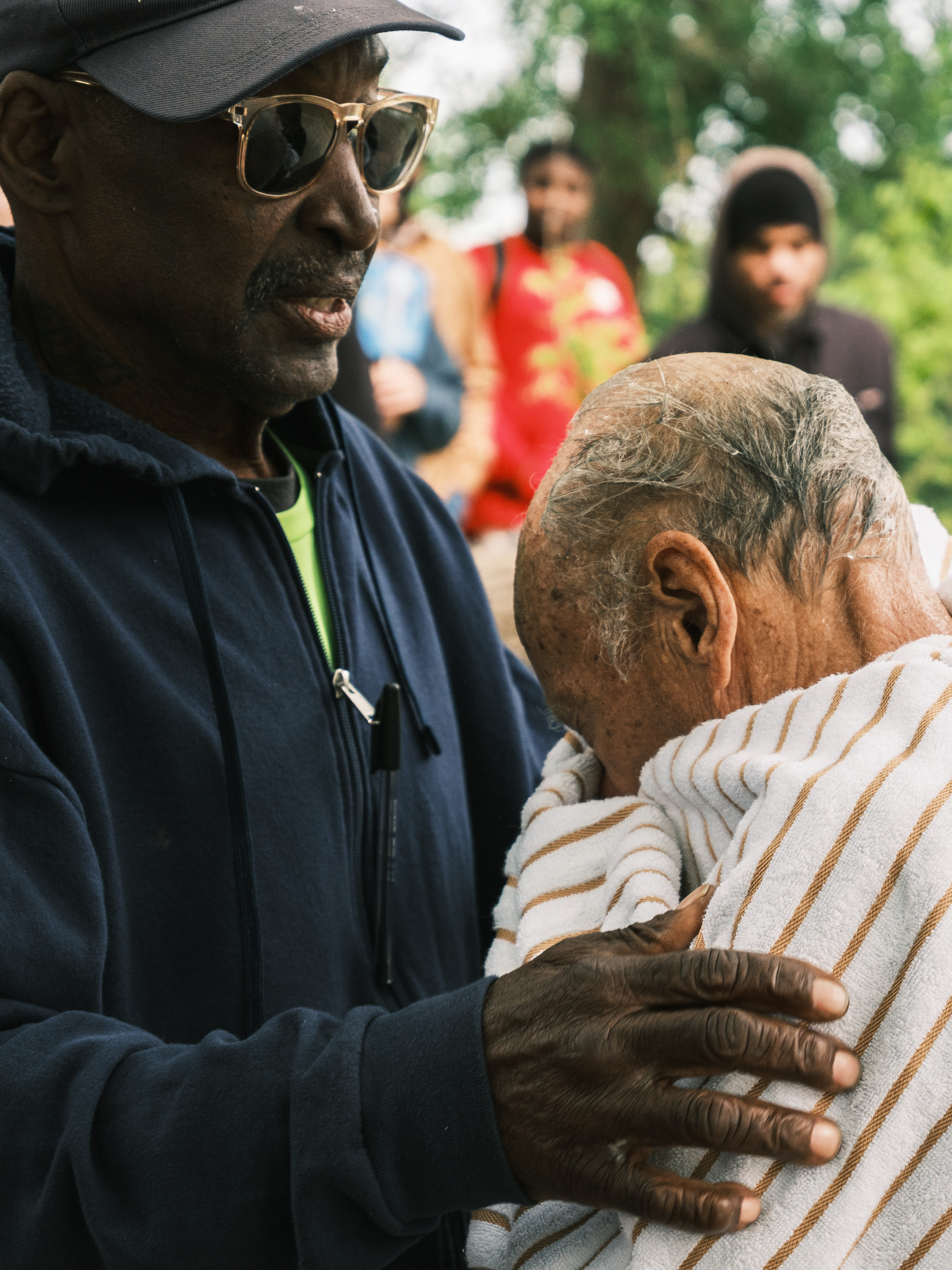 John Dokken dries off after being baptized by Jimmy Dorrell and Kevin Brown during Church Under the Bridge’s Easter service.