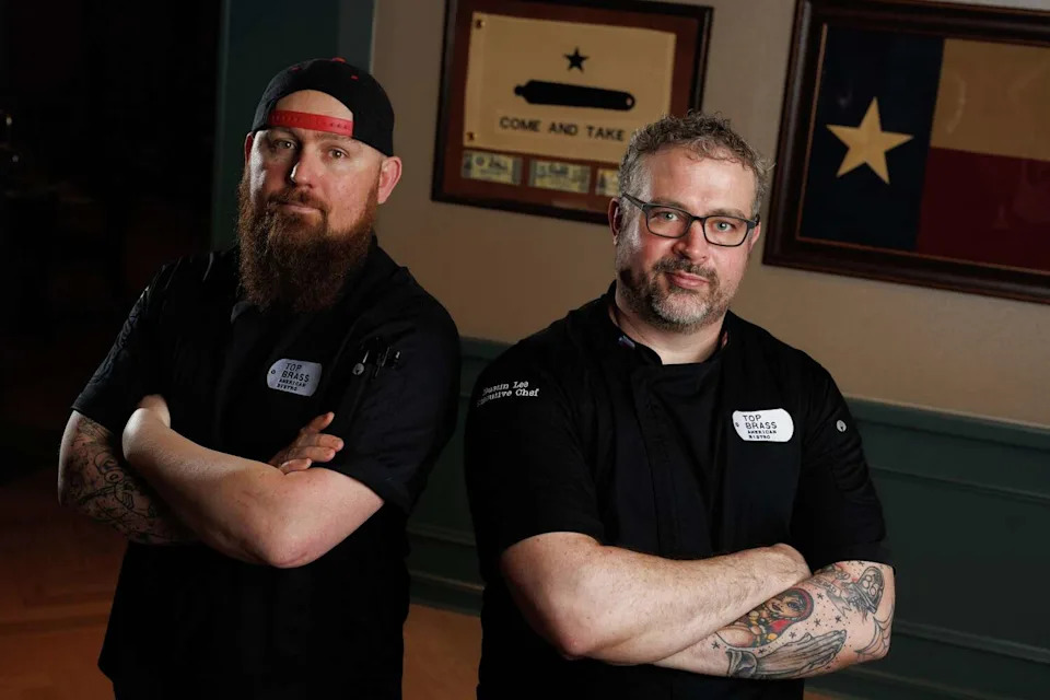 Executive Chef Dustin Lee, right, and Executive Sous Chef Jason Hart created the menu at Top Brass in Addison. Lee previously owned Beast & Co. in Fort Worth. Hart is an Army veteran who served six tours in the Middle East and in Korea. After he left the military, he went to culinary school. (Nathan Hunsinger/The Dallas Morning News)