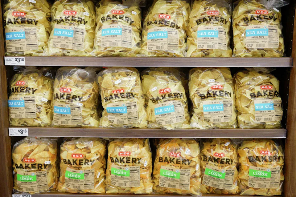 Bags of H-E-B tortilla chips sit on a shelf before a ribbon cutting ceremony for an H-E-B store, Tuesday, July 18, 2023 in McKinney, Texas. (Elias Valverde II/Dallas Morning News)