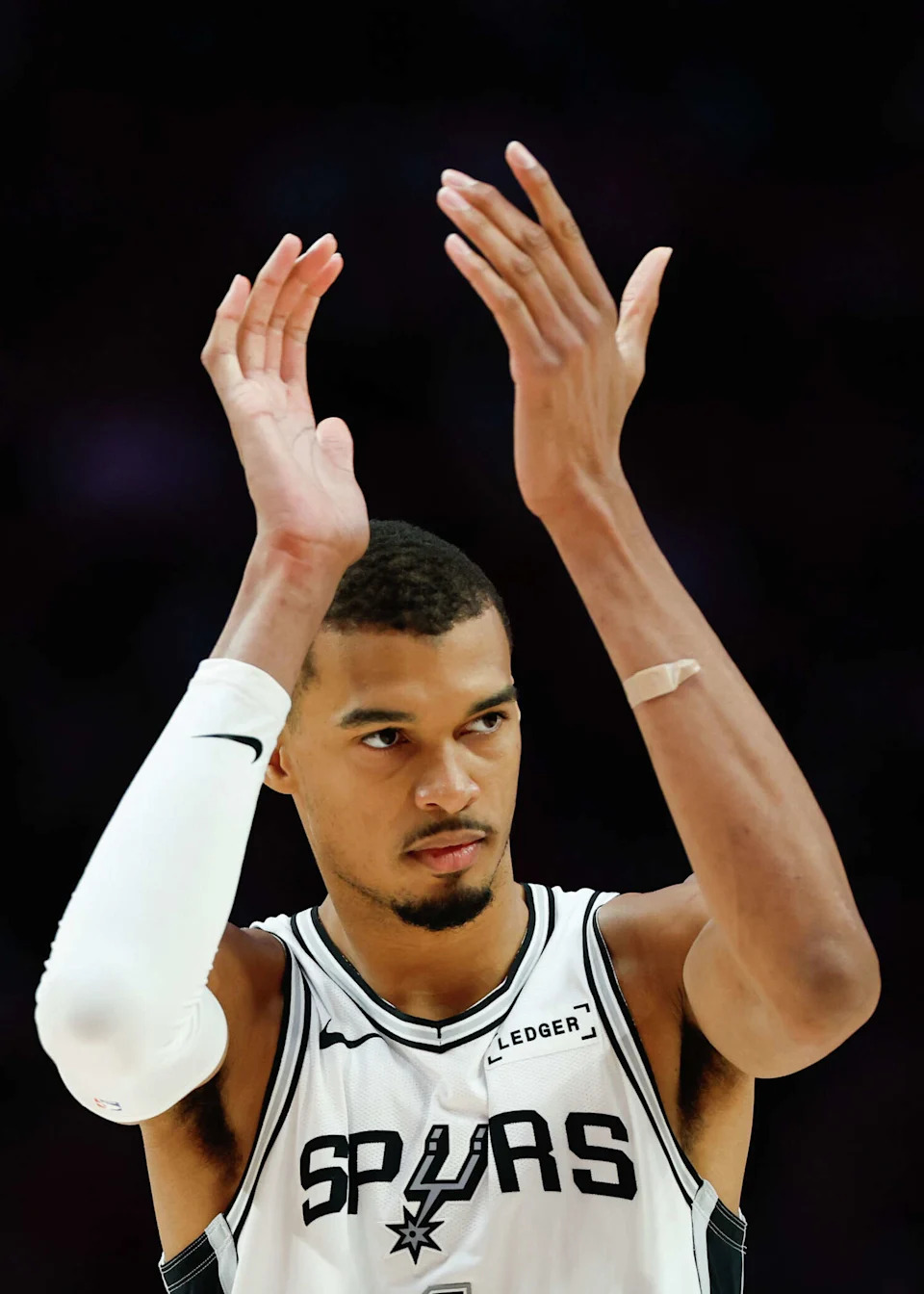 San Antonio Spurs forward Victor Wembanyama (1) claps his hands during the third quarter of Game 4 of a first-round NBA playoff series Portland Trail Blazers at Moda Center on Sunday, April 26, 2026. (Sam Owens/San Antonio Express-News)
