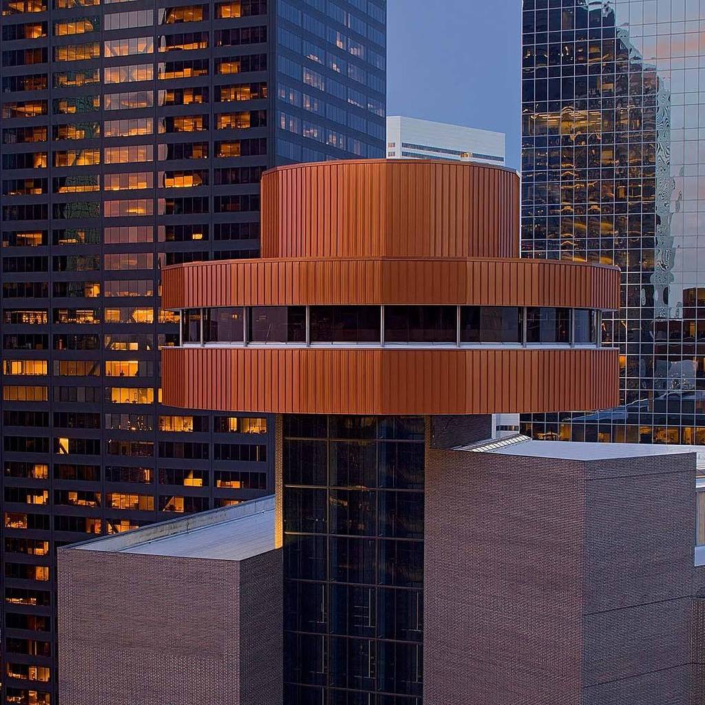 Image shows the Spindletop restaurant in Houston at night.