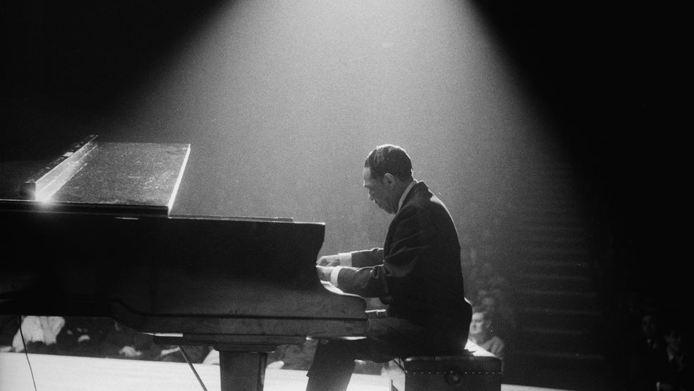 10th February 1963:  American jazz band leader and composer, Duke Ellington (1899 - 1974) at the piano at the Fairfield Hall, Croydon during a British tour.  (Photo by John Pratt/Keystone Features/Getty Images)