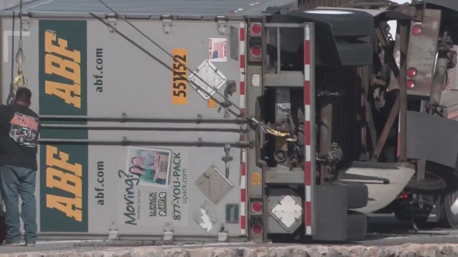 Semi-trailer on its side after I-10 crash
