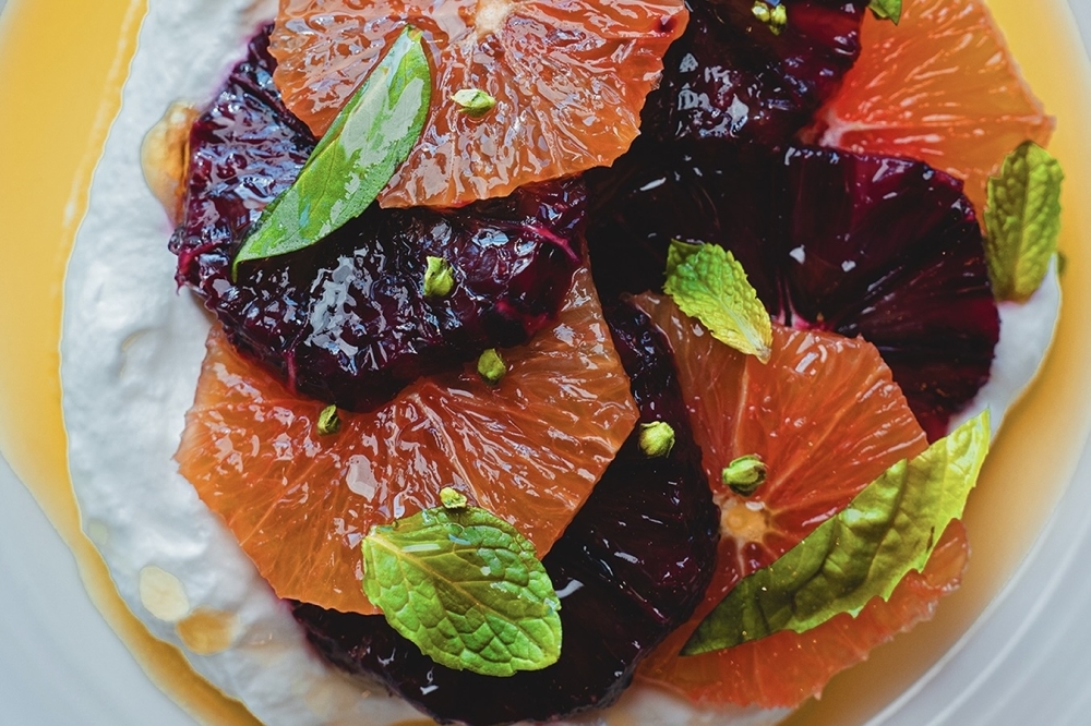 Osteria di Mercato's menu features the Citrus of the Season salad, made with ginger crème and blood oranges. (Courtesy Osteria di Mercato)