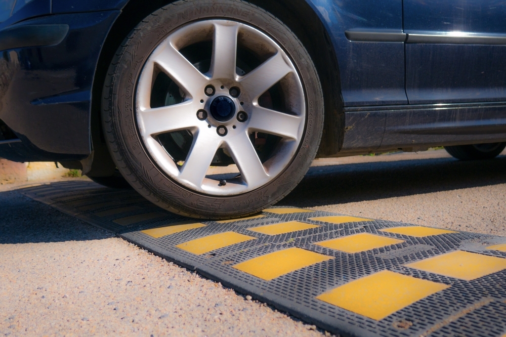 Speed humps are designed to slow traffic to about 10-20 mph. (Courtesy Adobe Stock)