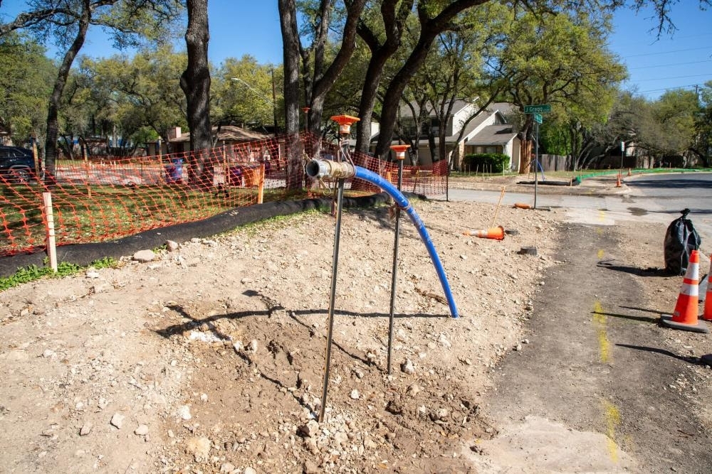 Oak Knoll Flood Risk Reduction project construction with hydrostatic water testing equipment