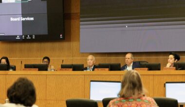 Houston ISD's board of managers and Superintendent Mike Miles sitting in the HISD board room on April 9
