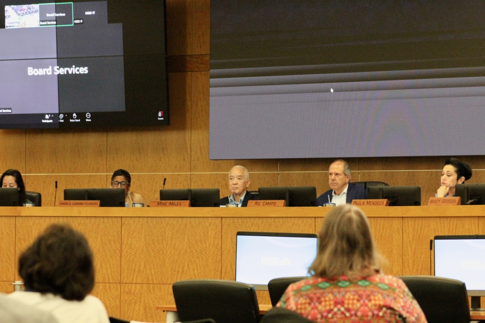 Houston ISD's board of managers and Superintendent Mike Miles sitting in the HISD board room on April 9