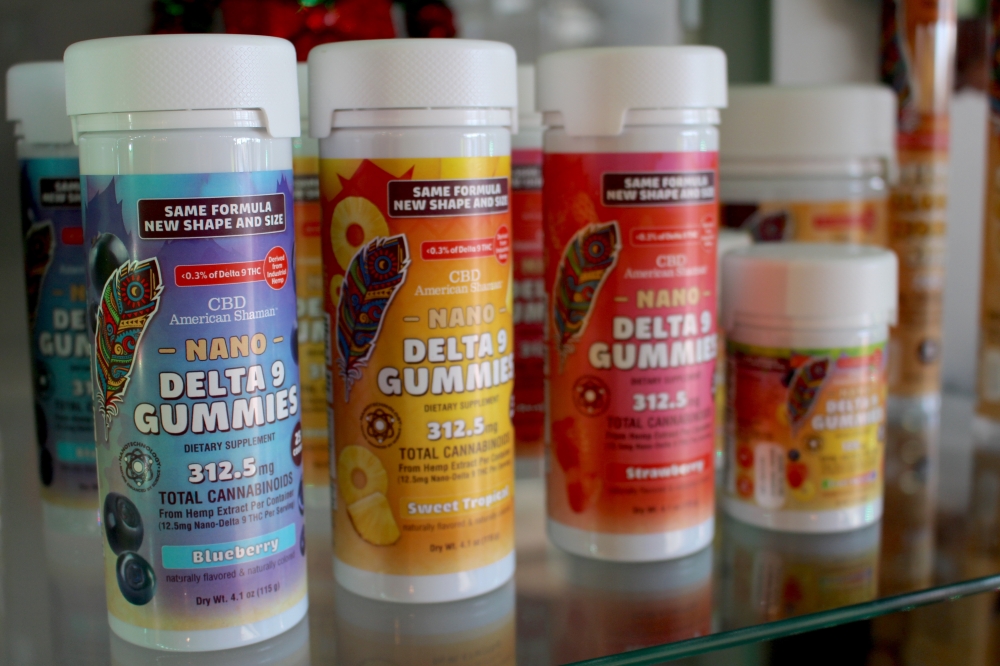 Colorful THC products on a shelf.