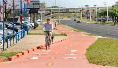 A man rides his bike