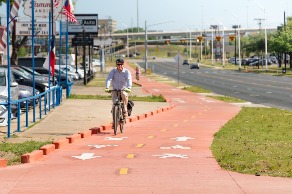 A man rides his bike