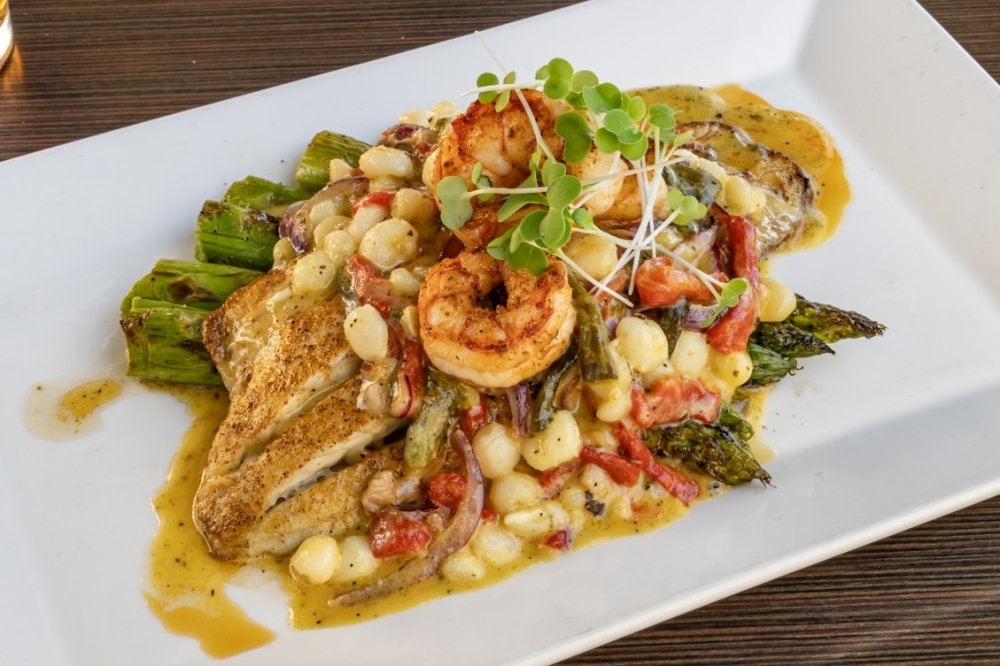 Entrees at Schilleci's include pan-seared fresh fish with red shrimp served with honey-mustard wine sauce. (Courtesy Schilleci's New Orleans Kitchen)