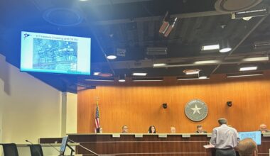 Public Works Director Michael Thane presents information about the supplemental project contract to improve water pressure near CR 172 and Hester's Crossing. (Brooke Sjoberg/Community Impact)