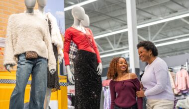 Mom and daughter shopping in Walmart with mannequin showcase