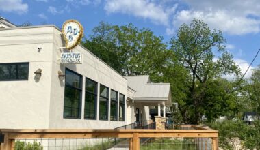Austin Oyster Co. is now open in a reimagined 1950s craftsman home. The interior features a bar made from the original wood from the home and hand painted tiles. (Katlynn Fox/Community Impact)