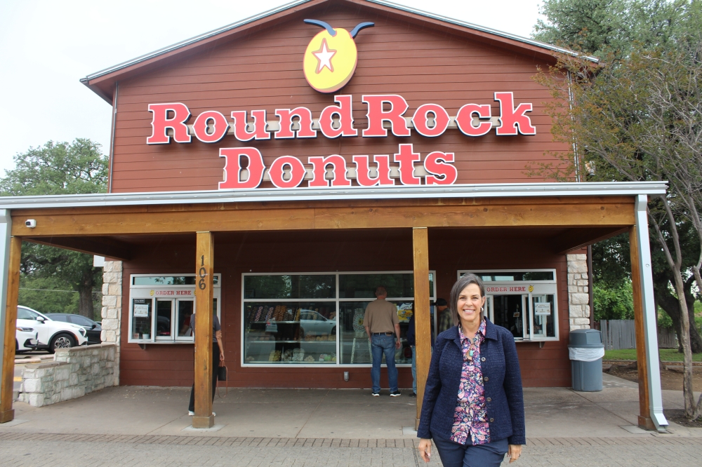 Deanne Mohen, bakery manager, stands outside of Round Rock Donuts. (Jillian Nachtigal/Community Impact)