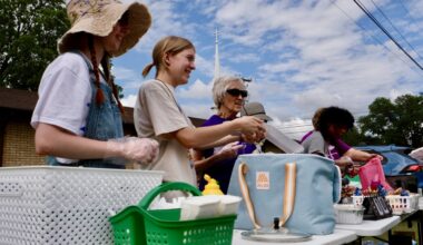 Volunteers with nonprofit Kat Kares serve hot meals to unhoused individuals in Georgetown. (Gracie Warhurst/Community Impact)