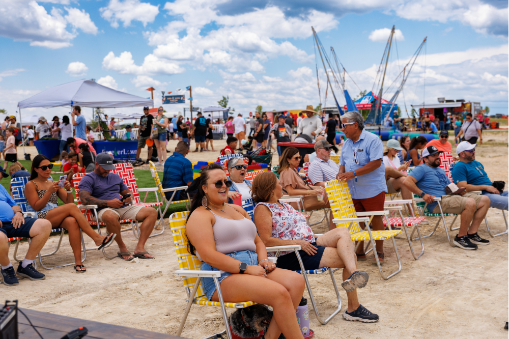amilies enjoying free community event at Mayfair New Braunfels Mayfest festival