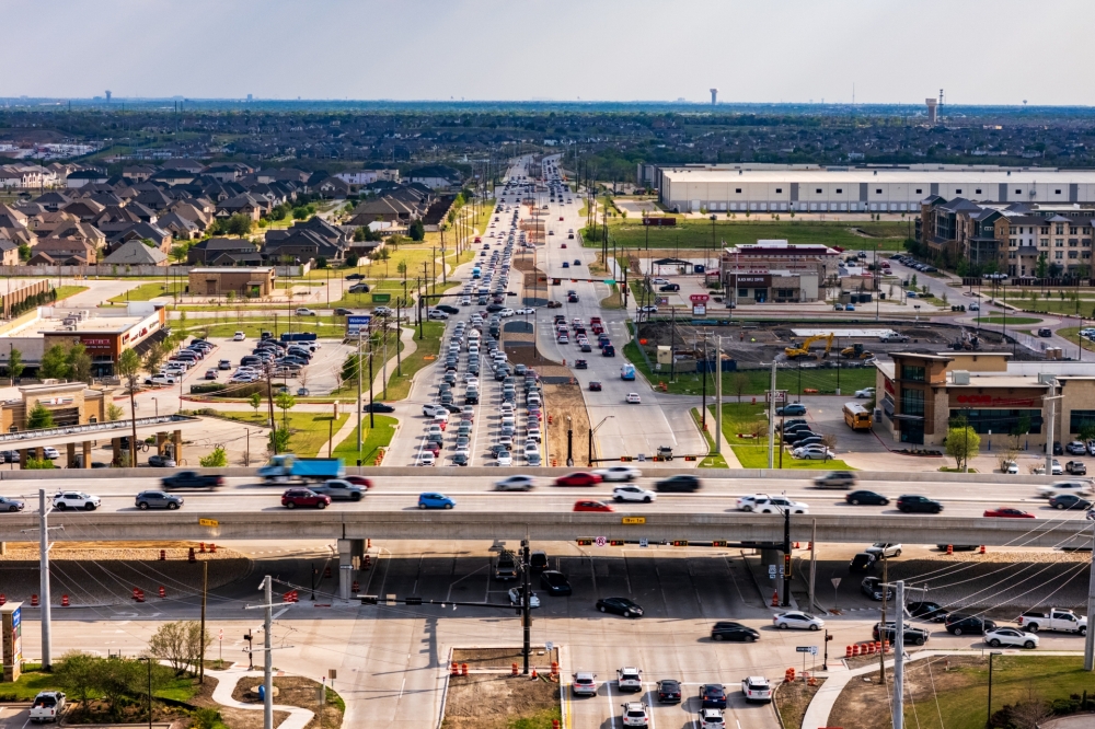 Drivers travel along the US 380 corridor at the Gee Road intersection on March 23. Construction on the Denton County improvement project began in 2022 and is expected to wrap up in April. (Sky Eyes/Community Impact)