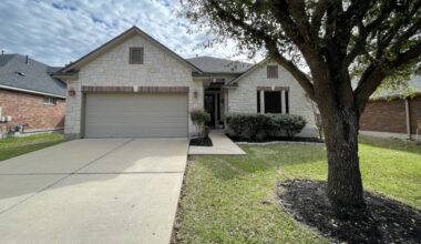 The front of a house and a yard