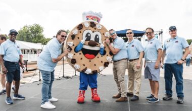 city staff with a person in a cookie costume