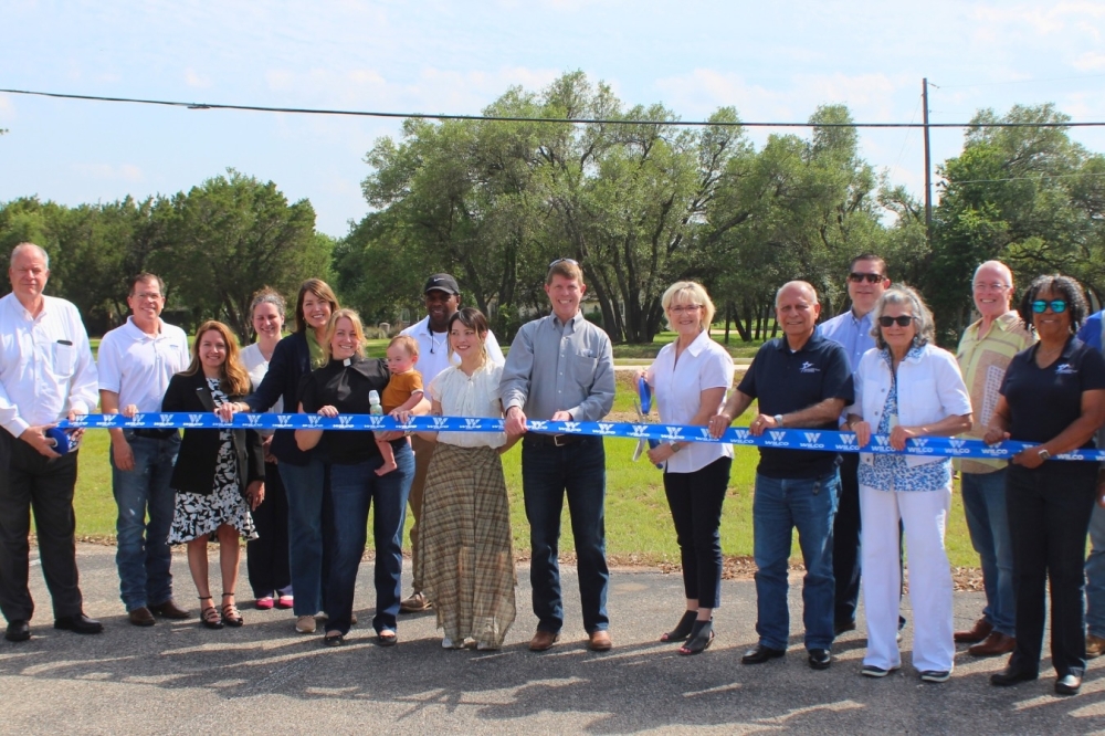 City of Round Rock and Williamson County officials held a ribbon-cutting to celebrate the completion of a project to widen Sam Bass Road on April 24. (Courtesy Williamson County)