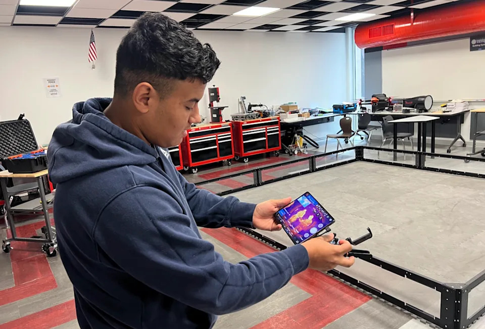<em>Sophomore Andrew Herrera operates a heat-sensitive drone at Premont Collegiate High School. (Lauren Wagner)</em>