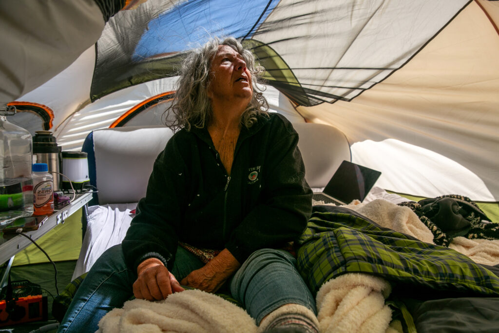 Diane Wilson sits in her tent, 14 days into her hunger strike, outside Dow’s Seadrift complex on March 16.