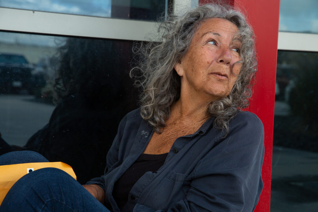 Diane Wilson waits at the entrance of Dow’s Seadrift offices.