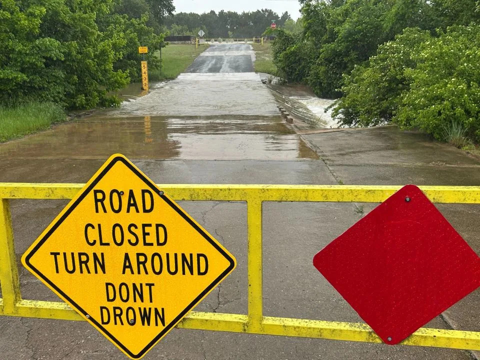 Flooded low water crossing closed in the Brushy Creek area of Williamson County on April 21, 2026 (KXAN Photo/Frank Martinez)